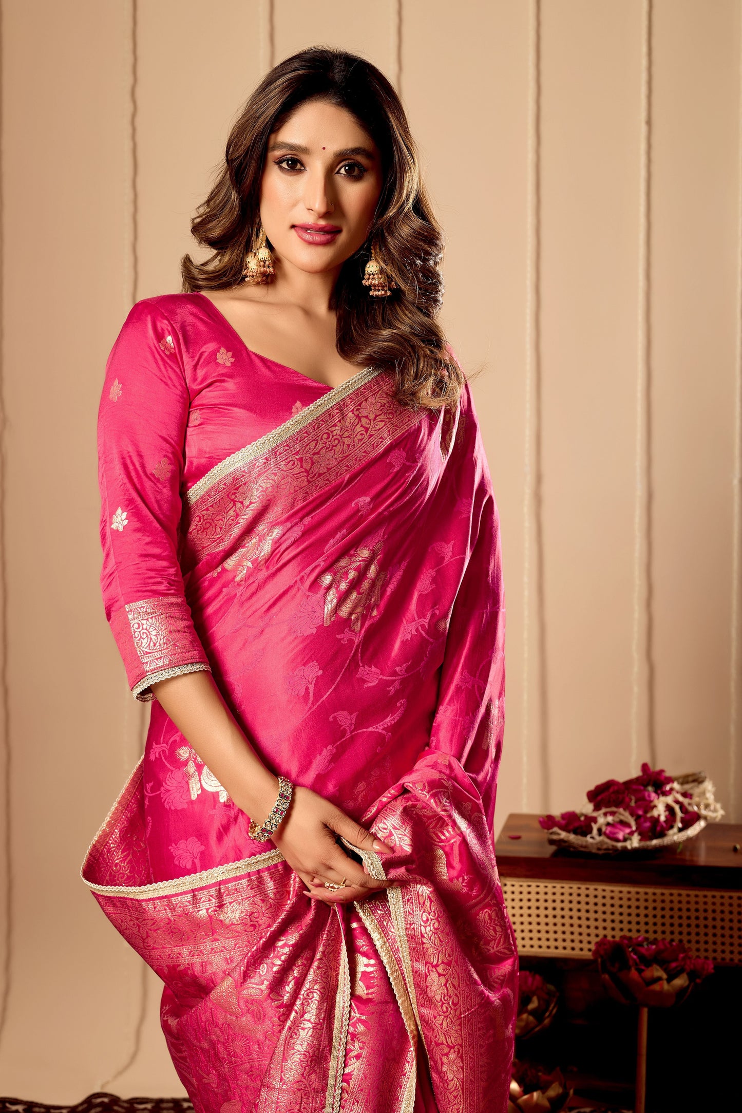 Vibrant Rani Pink satin Silk Saree with Rich Gold Zari Weaving and Elegant Traditional Motifs