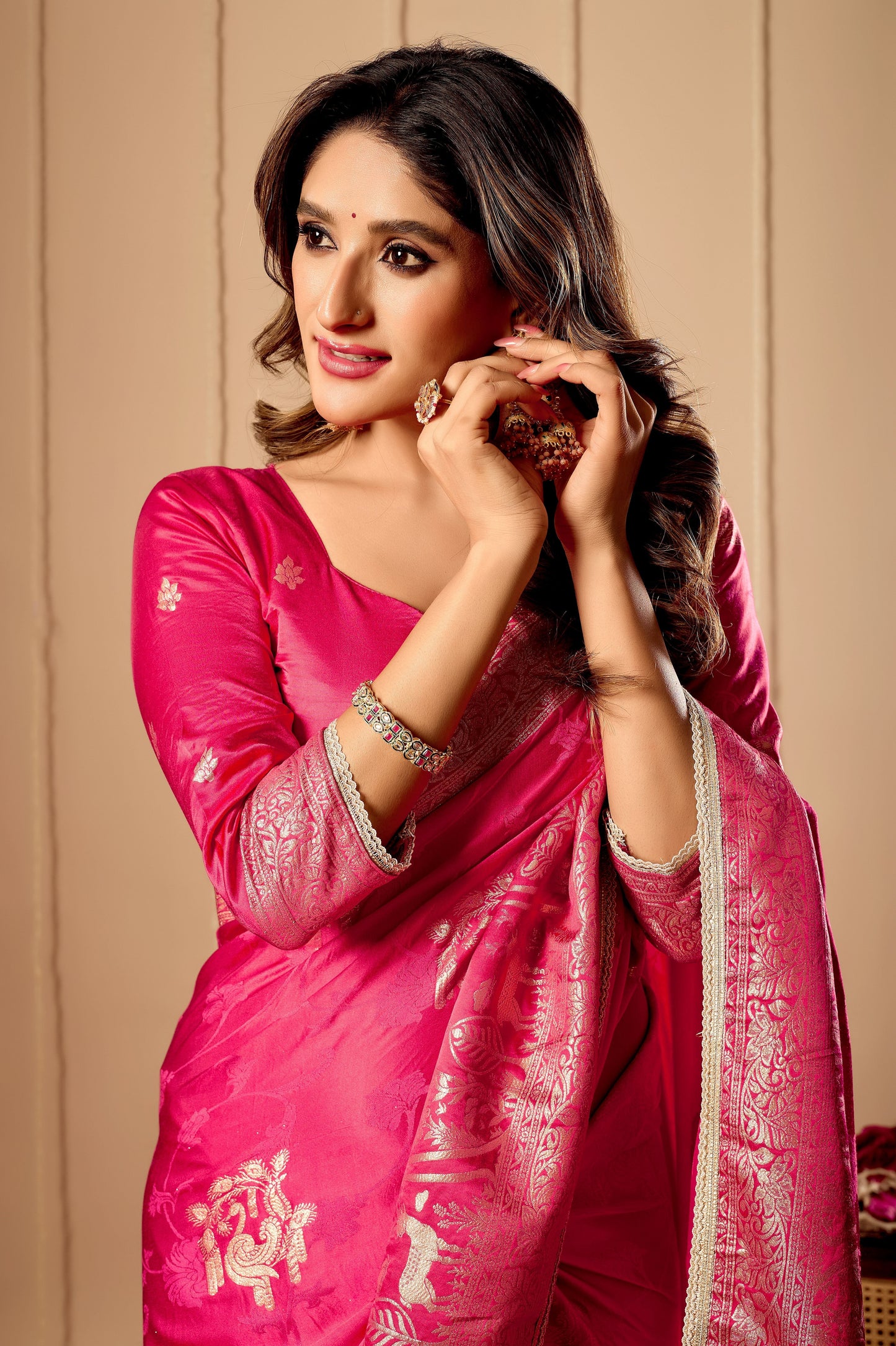 Vibrant Rani Pink  satin Silk Saree with Rich Gold Zari Weaving and Elegant Traditional Motifs